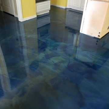 Pool house floor with blue metallic epoxy
