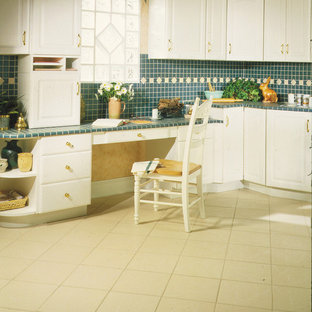 Inspiration for a traditional kitchen in Seattle with raised-panel cabinets, white cabinets, tile benchtops, green splashback, mosaic tile splashback and porcelain floors.