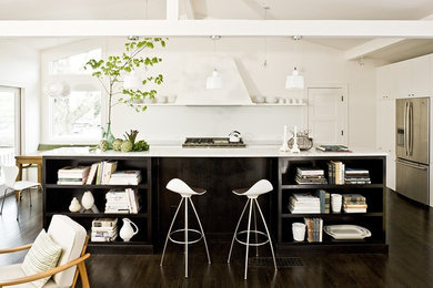 Eat-in kitchen - transitional eat-in kitchen idea in Portland with flat-panel cabinets, white cabinets and stainless steel appliances