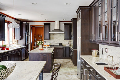 Eat-in kitchen - transitional l-shaped porcelain tile and multicolored floor eat-in kitchen idea in Chicago with an undermount sink, flat-panel cabinets, dark wood cabinets, quartz countertops, white backsplash, stone slab backsplash, stainless steel appliances and two islands