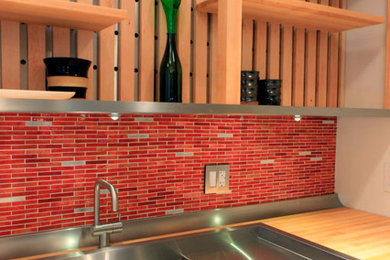 Kitchen - contemporary kitchen idea with a drop-in sink