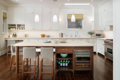 Kitchen - transitional kitchen idea in San Francisco with recessed-panel cabinets, white cabinets and stainless steel appliances