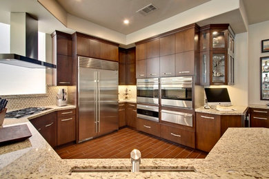 Example of a mid-sized transitional u-shaped porcelain tile open concept kitchen design in Other with an undermount sink, flat-panel cabinets, dark wood cabinets, granite countertops, multicolored backsplash, stainless steel appliances and no island