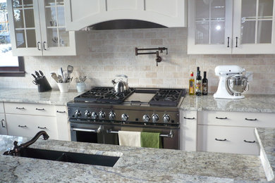Example of an arts and crafts kitchen design in Calgary