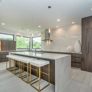Inspiration for a large modern u-shaped open plan kitchen in Other with an undermount sink, flat-panel cabinets, dark wood cabinets, marble benchtops, white splashback, stone slab splashback, panelled appliances, porcelain floors, with island, grey floor and white benchtop.