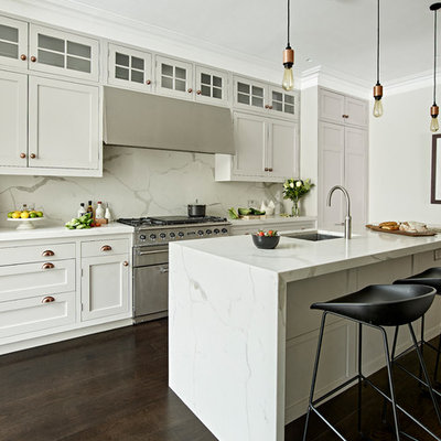 Eat-in kitchen - mid-sized transitional single-wall dark wood floor and brown floor eat-in kitchen idea in London with shaker cabinets, gray cabinets, marble countertops, gray backsplash, stainless steel appliances, an island, an undermount sink, gray countertops and marble backsplash