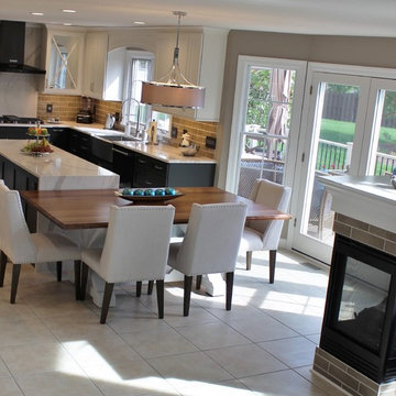 Quad Cities Kitchen With Gray Base Cabinets and Waterfall Counters