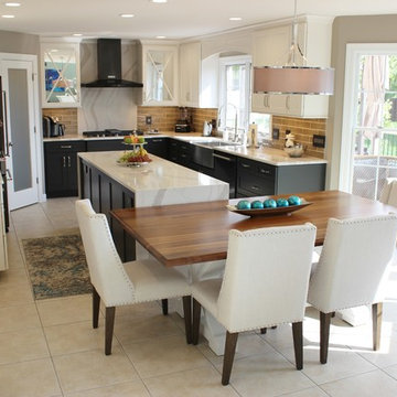 Quad Cities Kitchen With Gray Base Cabinets and Waterfall Counters