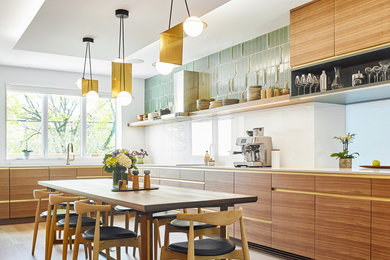 Example of a trendy l-shaped light wood floor and beige floor eat-in kitchen design in Toronto with flat-panel cabinets, medium tone wood cabinets, white backsplash, stone slab backsplash and white countertops