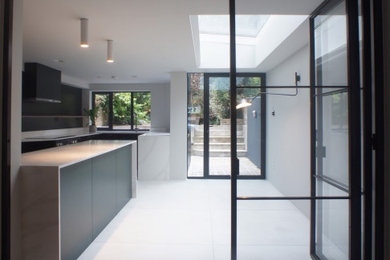 This is an example of a contemporary kitchen in London.