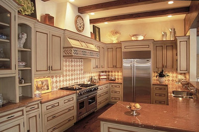 Mid-sized transitional u-shaped medium tone wood floor eat-in kitchen photo in Other with a double-bowl sink, recessed-panel cabinets, beige cabinets, granite countertops, multicolored backsplash, ceramic backsplash, stainless steel appliances and no island