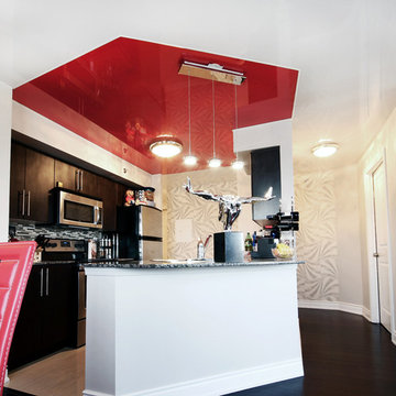 Red Gloss Ceiling ties Kitchen to Dining Area