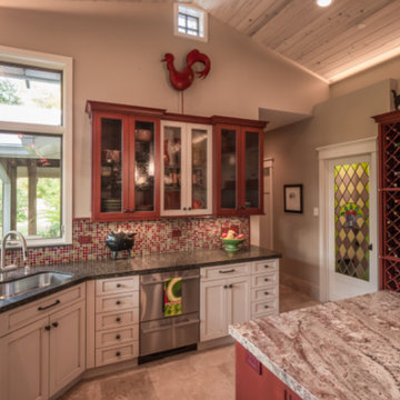 Red Kitchen with Multi-Color Backsplash