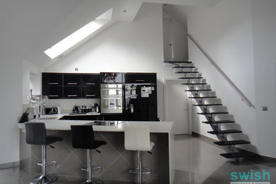 Inspiration for a large contemporary u-shaped open plan kitchen in Other with an island.