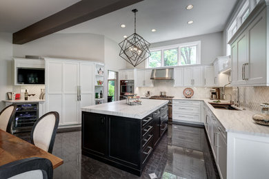 Example of a large transitional u-shaped gray floor and exposed beam eat-in kitchen design in Chicago with a single-bowl sink, shaker cabinets, white cabinets, quartzite countertops, white backsplash, paneled appliances, an island and multicolored countertops