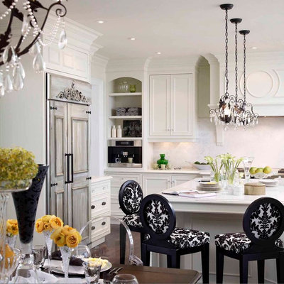 Eat-in kitchen - mid-sized traditional l-shaped dark wood floor eat-in kitchen idea in Toronto with recessed-panel cabinets, white cabinets, paneled appliances, a farmhouse sink, quartz countertops, white backsplash, stone slab backsplash and an island