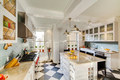 Enclosed kitchen - large traditional enclosed kitchen idea in New York with a double-bowl sink, glass-front cabinets, white cabinets, blue backsplash, subway tile backsplash, an island and quartzite countertops