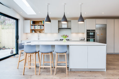 Kitchen - modern kitchen idea in Surrey