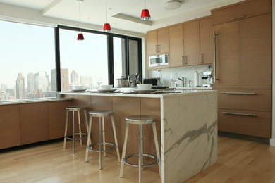 Rift Cut Cabinetry with Waterfall Countertop in Contemporary Manhattan Apartment