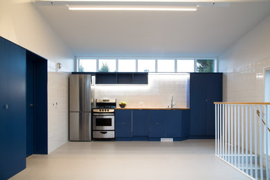 Example of a trendy kitchen design in Edmonton