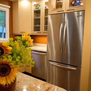 Small eclectic u-shaped eat-in kitchen in Edmonton with an undermount sink, flat-panel cabinets, light wood cabinets, granite benchtops, orange splashback, stone slab splashback, stainless steel appliances, a peninsula and orange benchtop.