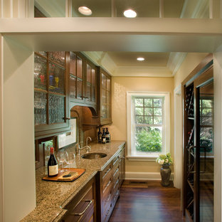 Inspiration for a timeless kitchen remodel in Minneapolis with glass-front cabinets