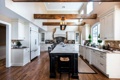 Inspiration for a large contemporary medium tone wood floor eat-in kitchen remodel in New York with an island