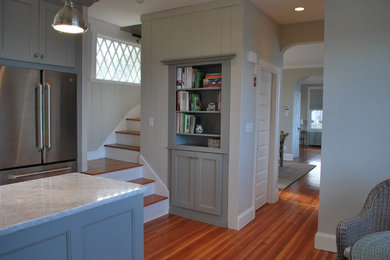 Example of a small transitional u-shaped dark wood floor open concept kitchen design in Boston with an undermount sink, recessed-panel cabinets, gray cabinets, marble countertops, white backsplash, subway tile backsplash, stainless steel appliances and no island