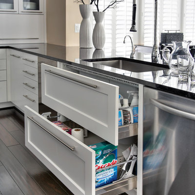 Inspiration for a large contemporary dark wood floor eat-in kitchen remodel in DC Metro with an undermount sink, shaker cabinets, white cabinets, marble countertops, white backsplash, stainless steel appliances, marble backsplash and a peninsula