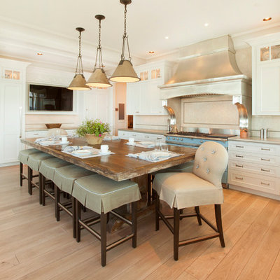 Kitchen - transitional kitchen idea in Omaha with recessed-panel cabinets, white cabinets and colored appliances