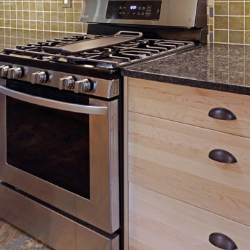 Roseville Kitchen - Maple cabinetry, slab drawers