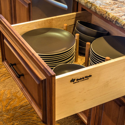 Mid-sized eclectic l-shaped slate floor and gray floor eat-in kitchen photo in Other with no island, recessed-panel cabinets, light wood cabinets, granite countertops, black backsplash, stone tile backsplash, stainless steel appliances and an undermount sink