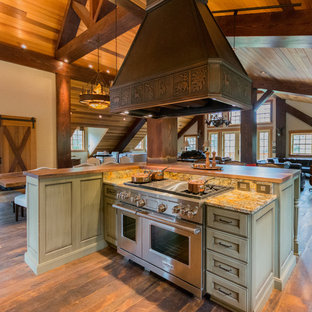 Large rustic open concept kitchen ideas - Large mountain style l-shaped dark wood floor open concept kitchen photo in Portland with a farmhouse sink, recessed-panel cabinets, distressed cabinets, granite countertops, stone slab backsplash, stainless steel appliances and an island