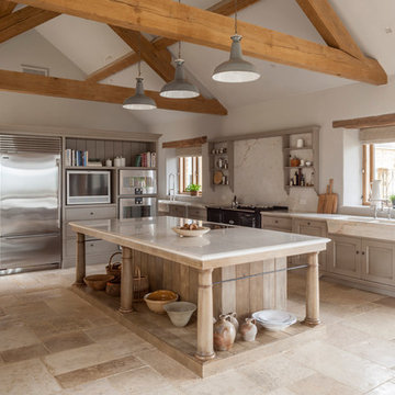 Rustic kitchen in Gloucestershire with oak island