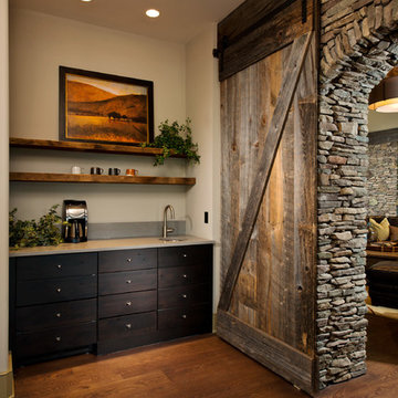 Rustic Kitchen with Wood Floor & Barn Door