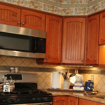 Rustic Maple Kitchen with Custom Made Cabinet Doors and Granite Counters