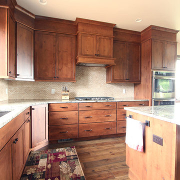 Rustic Stained Knotty Alder Cabinets in L Shaped Kitchen