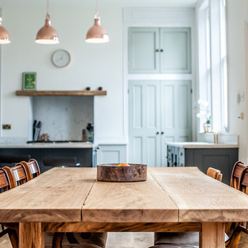 Rustic Wooden Table With Matching Dining Furniture In Traditional Kitchen In Liv