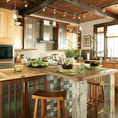 Example of a trendy kitchen design in Dallas with flat-panel cabinets
