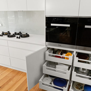 White kitchen with pull out internal drawers