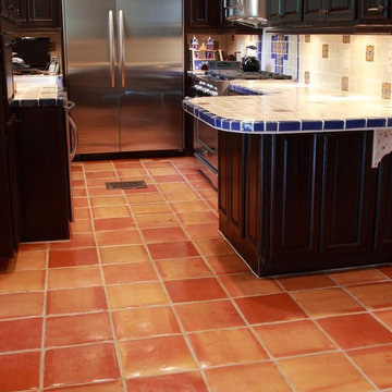 Saltillo Tile Flooring with Talavera Tile Countertop and Backsplash