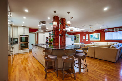 Eat-in kitchen - large contemporary l-shaped light wood floor and brown floor eat-in kitchen idea in San Diego with an undermount sink, flat-panel cabinets, white cabinets, marble countertops, multicolored backsplash, matchstick tile backsplash, stainless steel appliances and an island