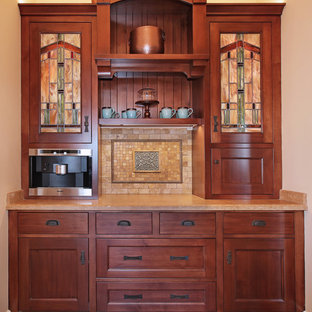 Design ideas for a small arts and crafts l-shaped kitchen in San Diego with an undermount sink, recessed-panel cabinets, dark wood cabinets, granite benchtops, multi-coloured splashback, ceramic splashback, stainless steel appliances, ceramic floors, with island and multi-coloured floor.