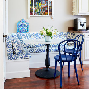 Mid-sized eclectic eat-in kitchen photos - Eat-in kitchen - mid-sized eclectic single-wall medium tone wood floor eat-in kitchen idea in San Francisco with raised-panel cabinets, white cabinets and granite countertops