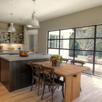 Example of a transitional eat-in kitchen design in Atlanta with open cabinets, beige cabinets, white backsplash and stainless steel appliances
