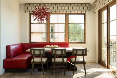 Example of a large trendy travertine floor kitchen/dining room combo design in San Diego