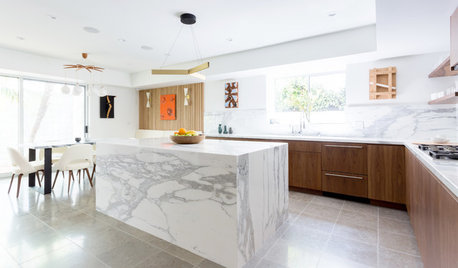 Walnut and Marble Combine in a Work-of-Art Kitchen