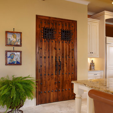 Sante Fe style double pantry doors.  Rustic and fun
