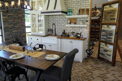 Example of a country kitchen design in Atlanta