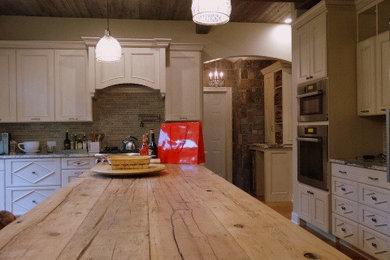 This is an example of a rustic kitchen in New York.